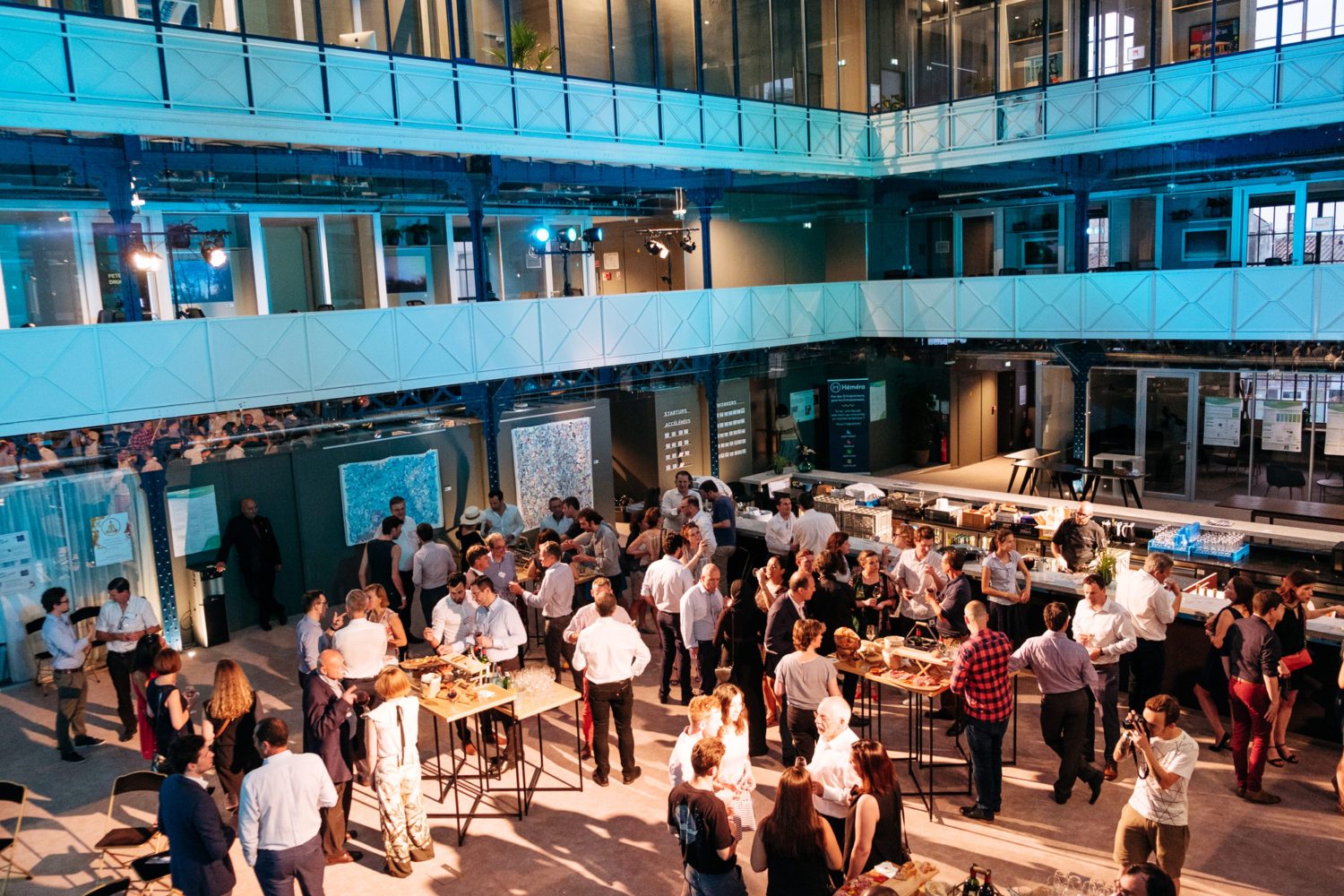 Evening event in a beautifully lit atrium